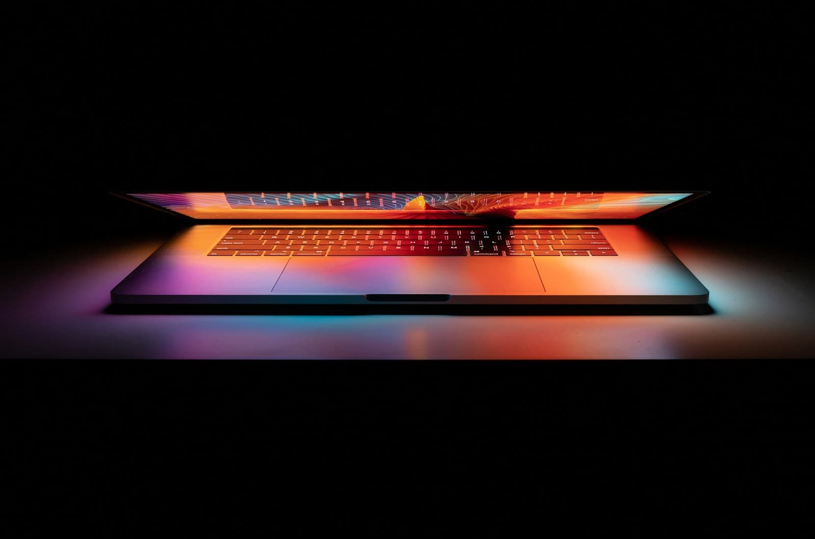 MacBook Pro on a white desk